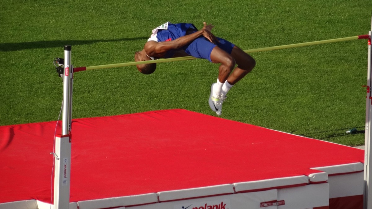 An athlete clearing the bar in a high jump