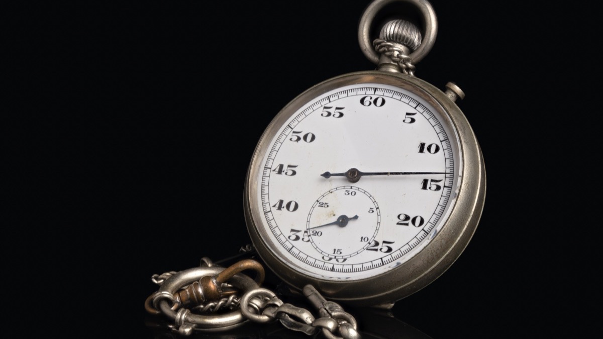A stopwatch held in the hand